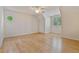 The room has hardwood floors, a ceiling fan, and two windows offering natural light at 3105 Birchton St, Johns Creek, GA 30022
