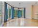 Dining room features bay windows and blue drapes at 3105 Birchton St, Johns Creek, GA 30022