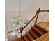Bright foyer with hardwood floors, staircase, pendant lighting, and an arched front door at 3105 Birchton St, Johns Creek, GA 30022