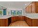 Bright kitchen features wood cabinetry, stainless steel appliances, and lots of storage at 3105 Birchton St, Johns Creek, GA 30022