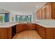 Kitchen area with wooden cabinets, white countertops, and a sink at 3105 Birchton St, Johns Creek, GA 30022