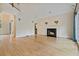 Spacious living room featuring a fireplace and hardwood floors at 3105 Birchton St, Johns Creek, GA 30022