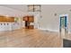 Open floor plan with kitchen cabinets and wooden floors at 3105 Birchton St, Johns Creek, GA 30022