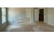 Large bedroom with natural light ready for flooring, painting, and your personal touches at 3294 Mill Forest Dr, Conyers, GA 30094