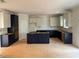 Spacious kitchen with dark blue and white cabinets, ready for appliances at 3294 Mill Forest Dr, Conyers, GA 30094