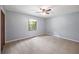 Bright bedroom filled with natural light and closet at 3400 Bonds Lake Nw Rd, Conyers, GA 30012