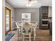 Dining room adjacent to the kitchen and features access to the backyard patio at 3400 Bonds Lake Nw Rd, Conyers, GA 30012
