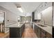 Kitchen with an expansive center island, stainless steel appliances, and granite countertops at 3400 Bonds Lake Nw Rd, Conyers, GA 30012