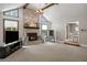 Bright living room with brick fireplace, large windows, and gray walls that create a light and airy space at 3400 Bonds Lake Nw Rd, Conyers, GA 30012