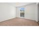 Bedroom with neutral carpet and natural light from a window at 1021 Riverbend Club Se Dr, Atlanta, GA 30339