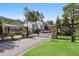 Gated entrance to Chattahoochee Trail with stone pillars and lush landscaping at 1021 Riverbend Club Se Dr, Atlanta, GA 30339