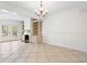 Bright room with fireplace, built-ins, and chandelier at 1021 Riverbend Club Se Dr, Atlanta, GA 30339