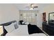 Comfortable bedroom with ceiling fan, modern furniture, and natural light at 2400 Cumberland Se Pkwy # 803, Atlanta, GA 30339