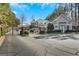 Gated community entrance with manicured landscaping and controlled access for added security and privacy at 2400 Cumberland Se Pkwy # 803, Atlanta, GA 30339