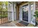Inviting front door with glass panel and decorative wreath for a touch of elegance at 2400 Cumberland Se Pkwy # 803, Atlanta, GA 30339