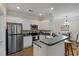 Bright kitchen featuring stainless appliances, tiled floor and white cabinets at 2400 Cumberland Se Pkwy # 803, Atlanta, GA 30339