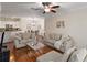 Open-concept living room seamlessly connects to the kitchen and dining area, perfect for entertaining at 2400 Cumberland Se Pkwy # 803, Atlanta, GA 30339