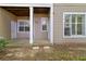 An outdoor patio features a minimalist design, set against a green lawn at 2400 Cumberland Se Pkwy # 803, Atlanta, GA 30339