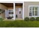 Ground level patio view offering a serene outdoor space and view of the community landscaping at 2400 Cumberland Se Pkwy # 803, Atlanta, GA 30339