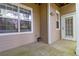 Neutral-toned patio features a textured concrete floor, creating a simple outdoor living space at 2400 Cumberland Se Pkwy # 803, Atlanta, GA 30339