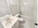 Clean bathroom with a tub, tile flooring, vanity, and modern fixtures for a refreshing experience at 6105 Ivey Hill Dr, Cumming, GA 30040