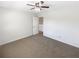 Bedroom with a ceiling fan and a door at 6105 Ivey Hill Dr, Cumming, GA 30040