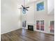 Bright living room featuring soaring ceilings, a fireplace, and beautiful flooring at 6105 Ivey Hill Dr, Cumming, GA 30040