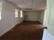 Finished basement with wood-look flooring, and white-painted walls at 921 Eagle Crossing Dr, Lawrenceville, GA 30044