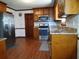 Well-equipped kitchen featuring stainless steel appliances and wooden cabinetry at 921 Eagle Crossing Dr, Lawrenceville, GA 30044