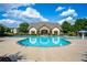 Outdoor community pool with ample seating surrounded by lush landscaping at 2060 Executive Dr, Duluth, GA 30096