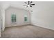 Large bedroom with vaulted ceiling, modern ceiling fan, and light-filled windows at 3115 Corsair Curv, Cumming, GA 30040