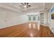 Open and airy bedroom with plenty of natural light, hardwood floors, and a modern ceiling fan at 3115 Corsair Curv, Cumming, GA 30040