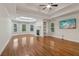 Expansive bedroom with tray ceiling, fireplace, and built-in shelving at 3115 Corsair Curv, Cumming, GA 30040