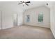 Light and bright bedroom featuring a vaulted ceiling and two windows at 3115 Corsair Curv, Cumming, GA 30040