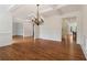 Spacious living area with hardwood floors and detailed trim work at 3115 Corsair Curv, Cumming, GA 30040