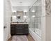 Stylish bathroom with granite-topped vanity and tiled shower-over-tub at 103 Mill Pond Rd, Roswell, GA 30076