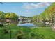 Picturesque waterfront view of the lake and surrounding greenery from the property at 103 Mill Pond Rd, Roswell, GA 30076