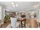 Open concept living space with hardwood floors, modern décor, and seamless flow throughout at 103 Mill Pond Rd, Roswell, GA 30076