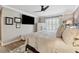Serene primary bedroom with a ceiling fan and a window at 103 Mill Pond Rd, Roswell, GA 30076