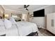 Cozy primary bedroom with modern ceiling fan and spacious layout at 103 Mill Pond Rd, Roswell, GA 30076