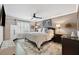 Inviting primary bedroom with soft lighting, a ceiling fan, and neutral decor at 103 Mill Pond Rd, Roswell, GA 30076