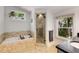 Bright bathroom with a soaking tub and a glass-enclosed shower at 1256 Spring Valley Ne Ln, Atlanta, GA 30306