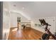 Bright and airy bonus room with hardwood floors and a comfortable sitting area at 1256 Spring Valley Ne Ln, Atlanta, GA 30306