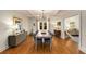 Formal dining room featuring hardwood floors, modern lighting, and ample natural light at 1256 Spring Valley Ne Ln, Atlanta, GA 30306
