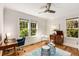 Bright home office with hardwood floors, two windows and modern furnishings at 1256 Spring Valley Ne Ln, Atlanta, GA 30306
