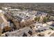 An aerial view of a multi-Gathering residential apartment building with ample parking and retail shops surrounding the property at 1850 Cotillion Dr # 4204, Dunwoody, GA 30338