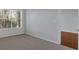 Bedroom with neutral carpet, large window and access to door at 1850 Cotillion Dr # 4204, Dunwoody, GA 30338