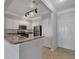 Modern kitchen featuring stainless steel appliances and a granite countertop at 1850 Cotillion Dr # 4204, Dunwoody, GA 30338