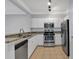 Well-lit kitchen featuring stainless steel appliances and granite counters at 1850 Cotillion Dr # 4204, Dunwoody, GA 30338