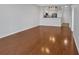 Open-concept layout featuring hardwood floors and kitchen view at 1850 Cotillion Dr # 4204, Dunwoody, GA 30338